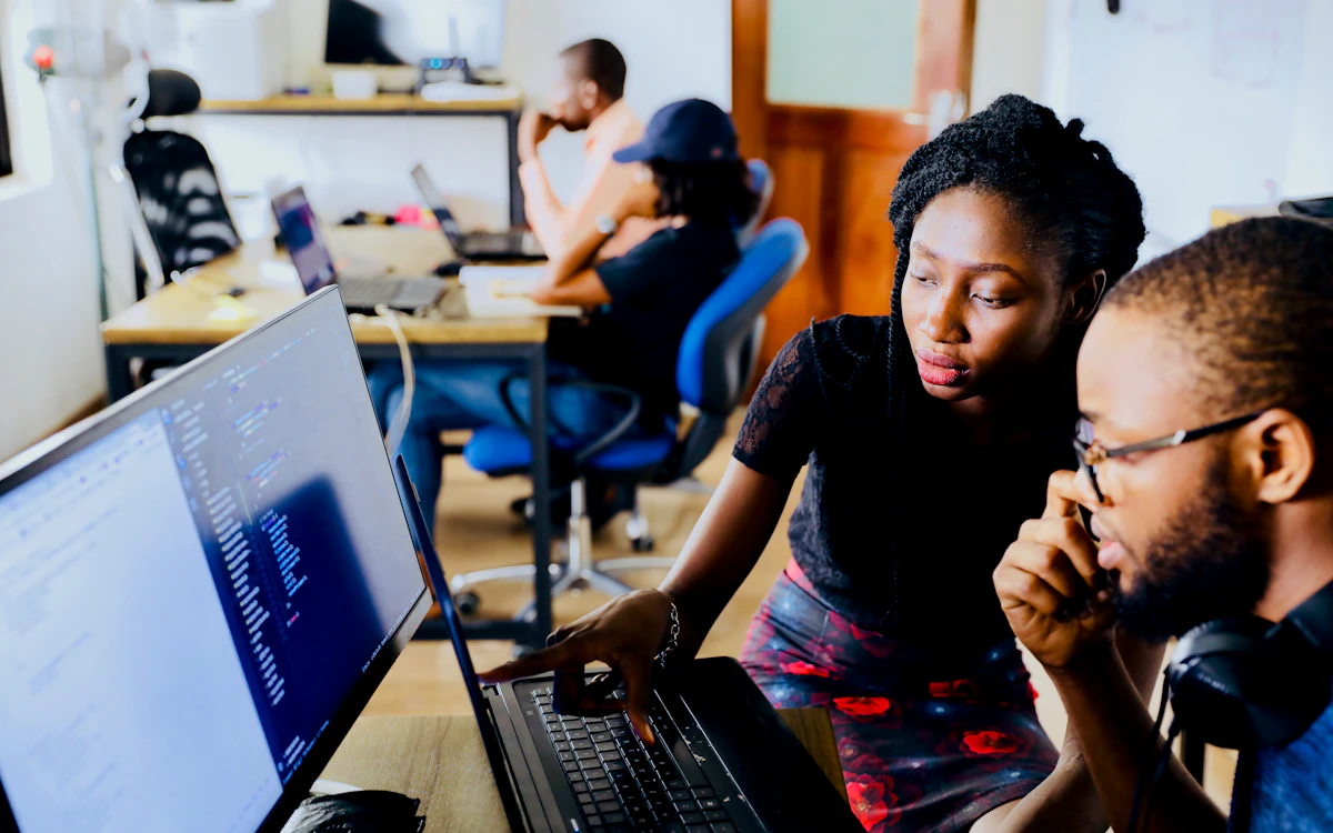 Marketer working at a laptop building a nonprofit lead generation funnel